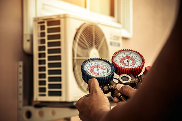 Professional Heat Pump Repair technician working in Unionville Center, OH